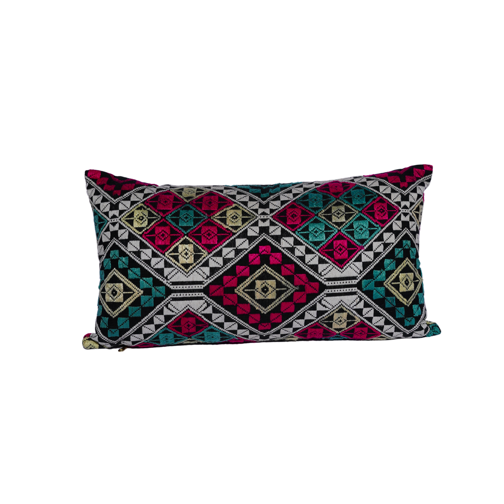 Decorative pillow with geometric pattern on a white background